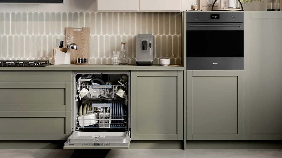 Panel-ready built-in dishwasher open in a modern kitchen with matching cabinet fronts